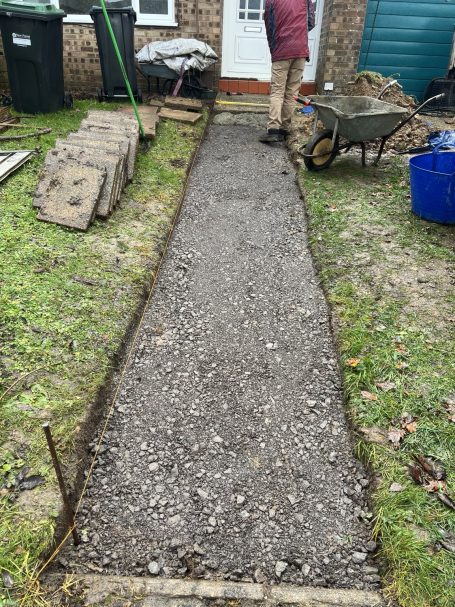 Pathway re-levelling with compacted hardcore sub-base installed